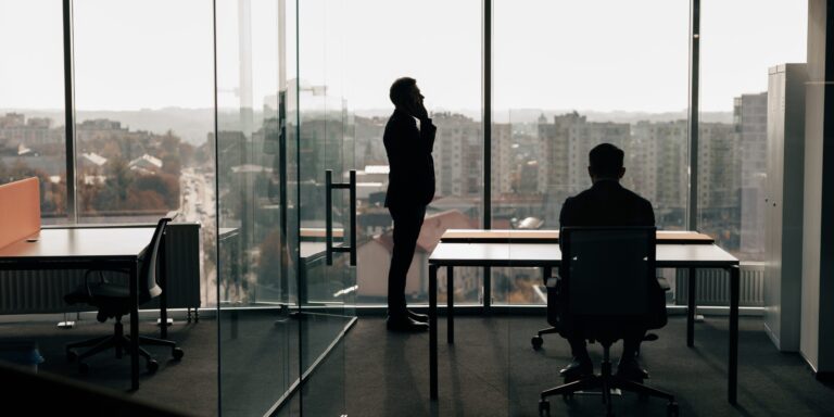 silhouette-photo-of-businesspeople-in-an-office